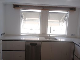 Encimera y chapeado en Silestone Persian White